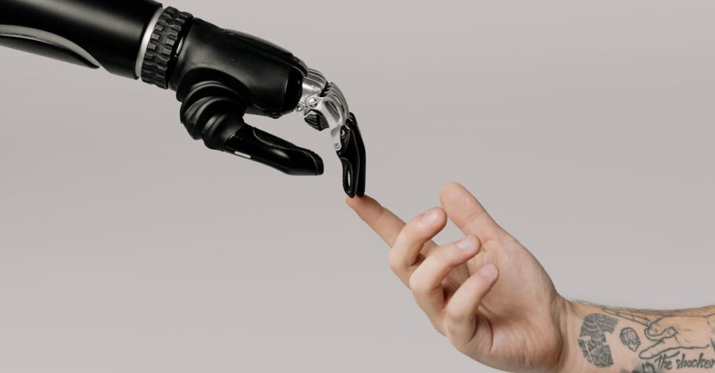 A human hand with tattoos reaching out to a robotic hand on a white background.